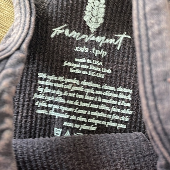 NWOT Happiness Runs Top with logo - Picture 8 of 8